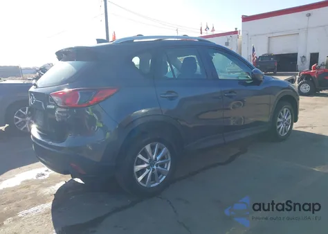 2014 Mazda Cx-5 Sport z USA, uszkodzony, nr VIN JM3KE4BE8E0419450